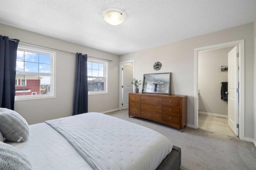 211 Evanscrest Way Nw, Calgary, AB - Indoor Photo Showing Bedroom