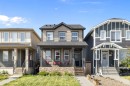 211 Evanscrest Way Nw, Calgary, AB  - Outdoor With Deck Patio Veranda With Facade 