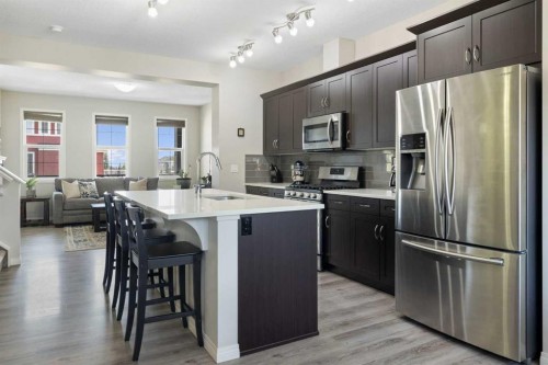 211 Evanscrest Way Nw, Calgary, AB - Indoor Photo Showing Kitchen With Stainless Steel Kitchen With Upgraded Kitchen