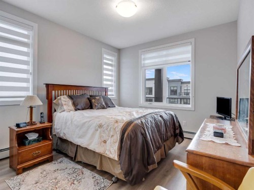 1412-200 Seton Circle Se, Calgary, AB - Indoor Photo Showing Bedroom