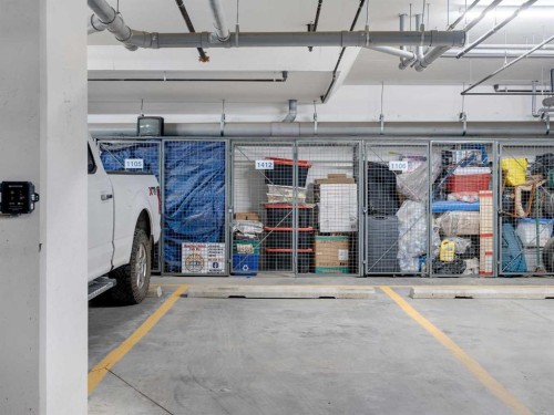 1412-200 Seton Circle Se, Calgary, AB - Indoor Photo Showing Garage