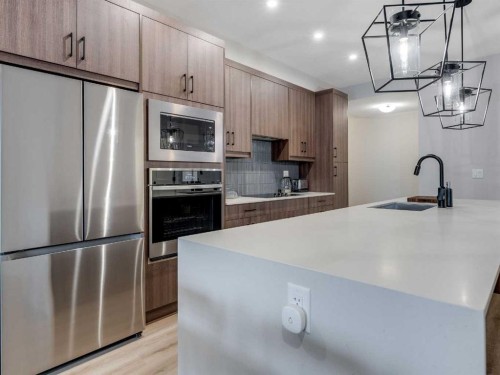 1412-200 Seton Circle Se, Calgary, AB - Indoor Photo Showing Kitchen