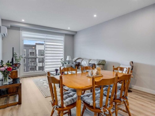 1412-200 Seton Circle Se, Calgary, AB - Indoor Photo Showing Dining Room