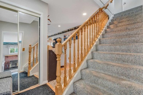 4771 Rundlehorn Drive Ne, Calgary, AB - Indoor Photo Showing Other Room With Fireplace