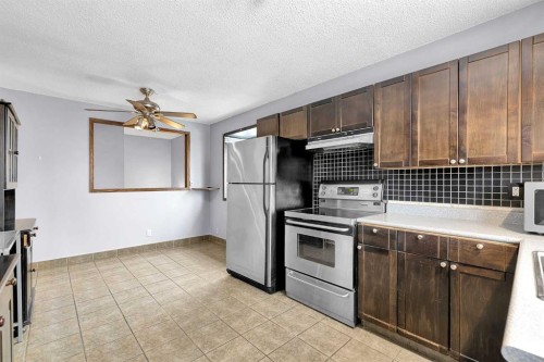 111 Dovertree Place Se, Calgary, AB - Indoor Photo Showing Kitchen