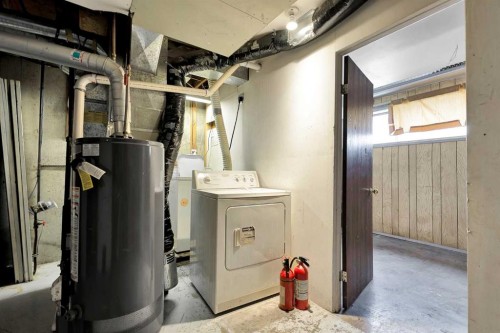 111 Dovertree Place Se, Calgary, AB - Indoor Photo Showing Laundry Room