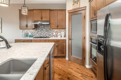 105 Aspen Stone Road Sw, Calgary, AB - Indoor Photo Showing Kitchen With Stainless Steel Kitchen With Upgraded Kitchen