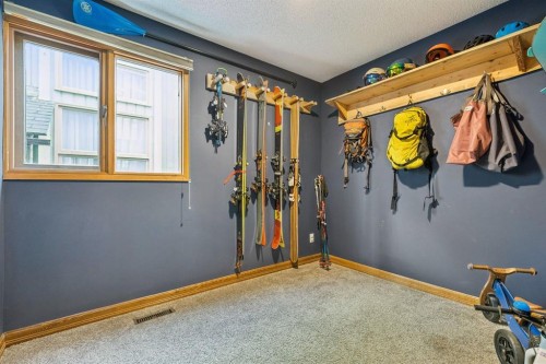 715 Coach Bluff Crescent Sw, Calgary, AB - Indoor Photo Showing Other Room