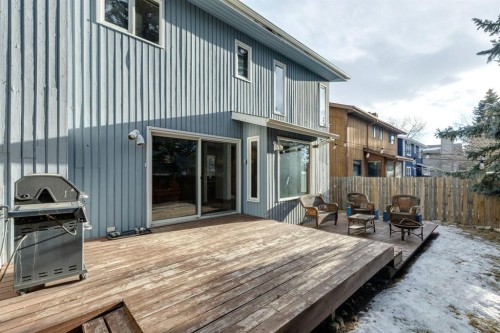 715 Coach Bluff Crescent Sw, Calgary, AB - Outdoor With Deck Patio Veranda With Exterior