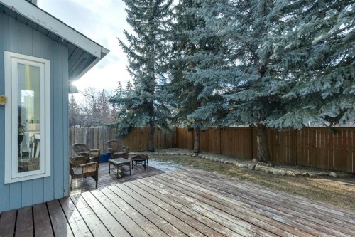 715 Coach Bluff Crescent Sw, Calgary, AB - Outdoor With Deck Patio Veranda