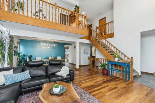 715 Coach Bluff Crescent Sw, Calgary, AB - Indoor Photo Showing Living Room