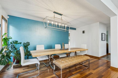 715 Coach Bluff Crescent Sw, Calgary, AB - Indoor Photo Showing Dining Room