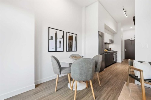 103-730 2 Avenue Sw, Calgary, AB - Indoor Photo Showing Dining Room