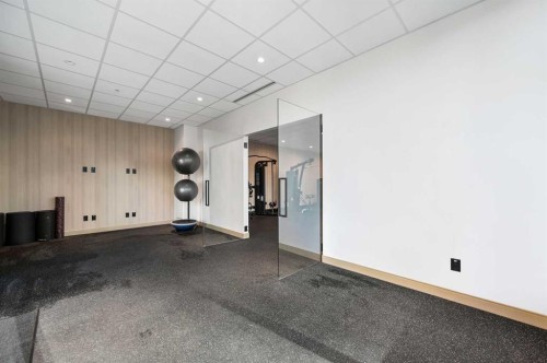 103-730 2 Avenue Sw, Calgary, AB - Indoor Photo Showing Other Room