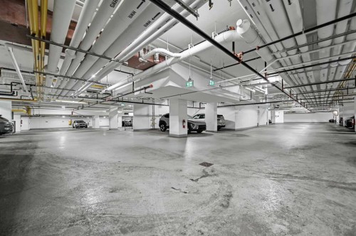 103-730 2 Avenue Sw, Calgary, AB - Indoor Photo Showing Garage