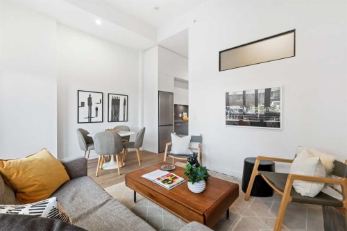 103-730 2 Avenue Sw, Calgary, AB - Indoor Photo Showing Living Room