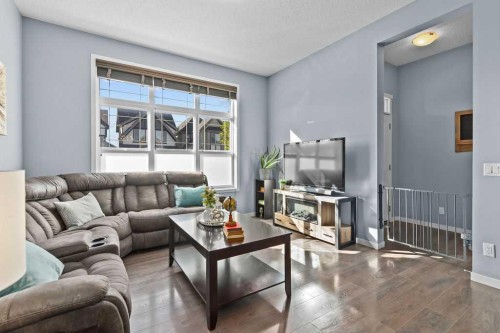 103 Masters Heights Se, Calgary, AB - Indoor Photo Showing Living Room