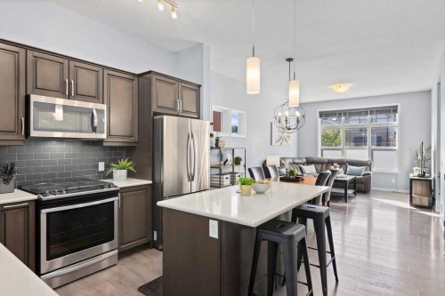 103 Masters Heights Se, Calgary, AB - Indoor Photo Showing Kitchen With Upgraded Kitchen