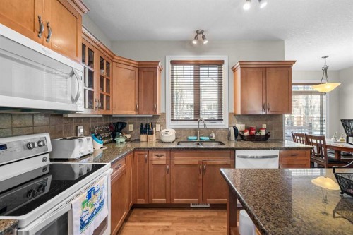 107 Panatella Close Nw, Calgary, AB - Indoor Photo Showing Kitchen
