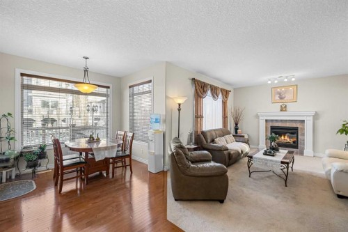 107 Panatella Close Nw, Calgary, AB - Indoor With Fireplace
