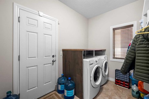 107 Panatella Close Nw, Calgary, AB - Indoor Photo Showing Laundry Room
