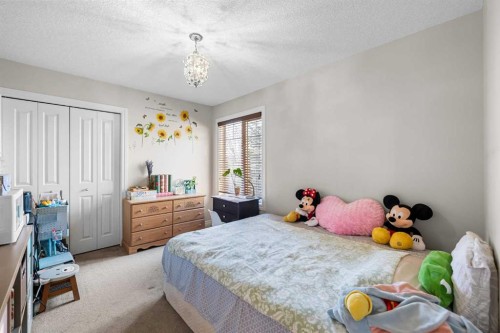 107 Panatella Close Nw, Calgary, AB - Indoor Photo Showing Bedroom