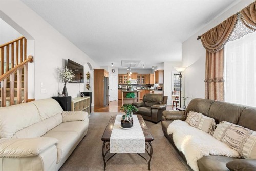 107 Panatella Close Nw, Calgary, AB - Indoor Photo Showing Living Room