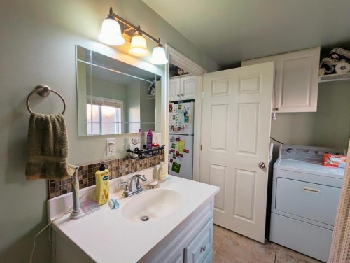 119 47 Avenue West, Claresholm, AB - Indoor Photo Showing Laundry Room