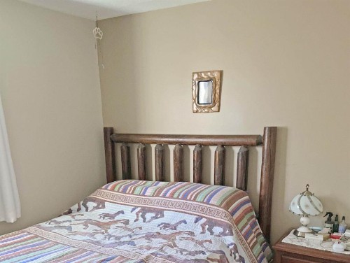 119 47 Avenue West, Claresholm, AB - Indoor Photo Showing Bedroom