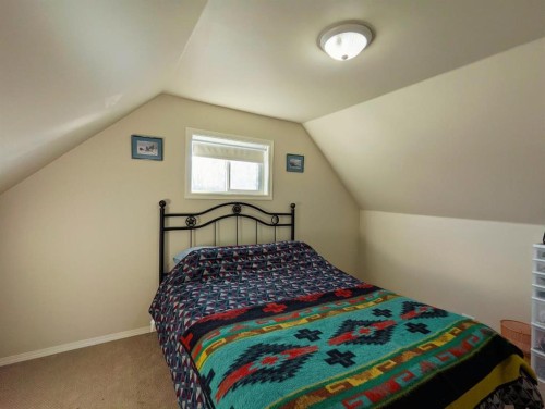 119 47 Avenue West, Claresholm, AB - Indoor Photo Showing Bedroom