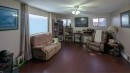119 47 Avenue West, Claresholm, AB  - Indoor Photo Showing Living Room 