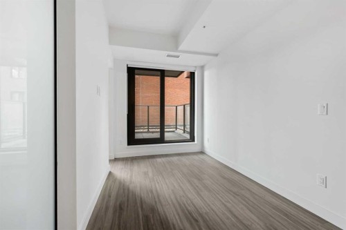 207-730 2 Avenue Sw, Calgary, AB - Indoor Photo Showing Other Room