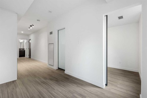 207-730 2 Avenue Sw, Calgary, AB - Indoor Photo Showing Other Room