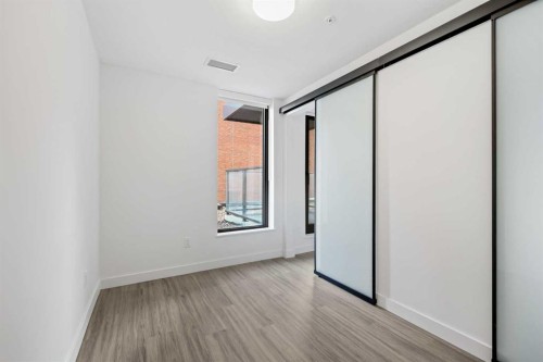 207-730 2 Avenue Sw, Calgary, AB - Indoor Photo Showing Other Room