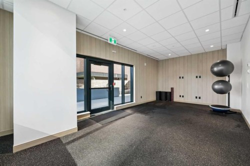 207-730 2 Avenue Sw, Calgary, AB - Indoor Photo Showing Other Room