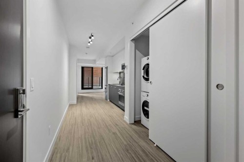 207-730 2 Avenue Sw, Calgary, AB - Indoor Photo Showing Other Room