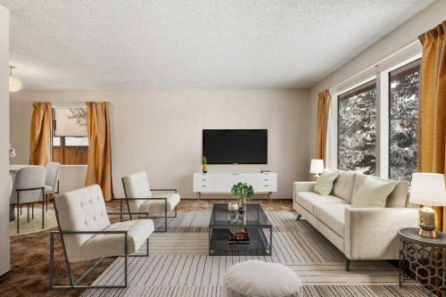 1151 Marcombe Crescent Ne, Calgary, AB - Indoor Photo Showing Living Room