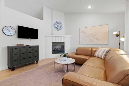 140 Allen Crescent, Vulcan, AB - Indoor Photo Showing Living Room With Fireplace