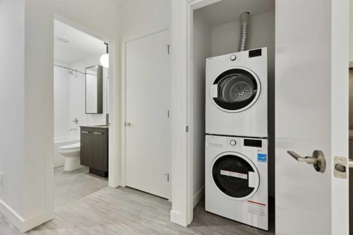 810-730 2 Avenue Sw, Calgary, AB - Indoor Photo Showing Laundry Room