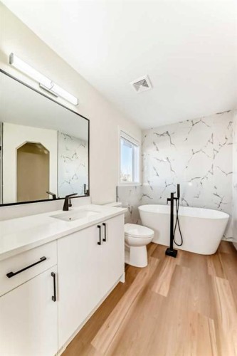 936 Cranston Drive Se, Calgary, AB - Indoor Photo Showing Bathroom
