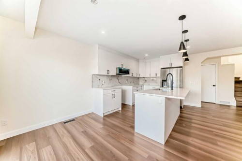 936 Cranston Drive Se, Calgary, AB - Indoor Photo Showing Kitchen