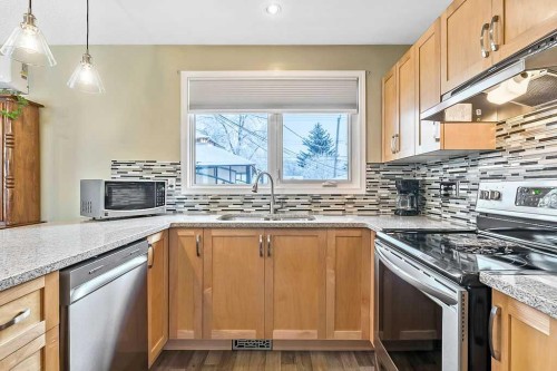312 Foritana Road Se, Calgary, AB - Indoor Photo Showing Kitchen With Double Sink