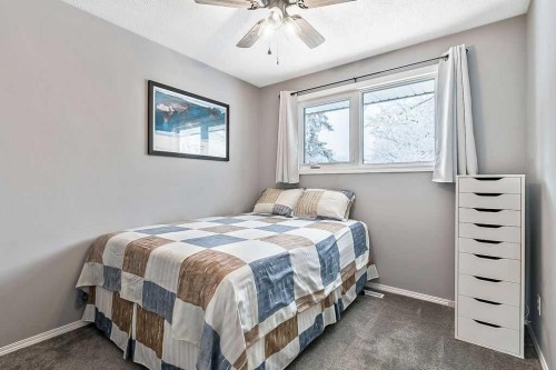 312 Foritana Road Se, Calgary, AB - Indoor Photo Showing Bedroom