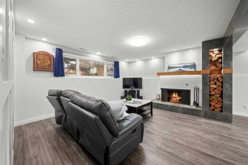 3251 Bearspaw Drive Nw, Calgary, AB - Indoor With Fireplace