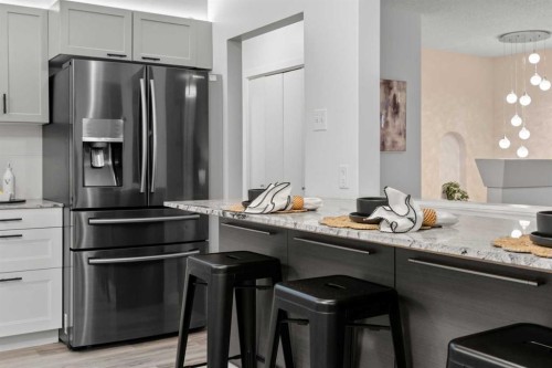 3251 Bearspaw Drive Nw, Calgary, AB - Indoor Photo Showing Kitchen With Stainless Steel Kitchen With Upgraded Kitchen