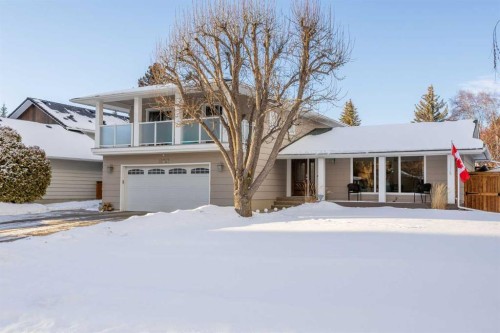 10723 Willowfern Drive Se, Calgary, AB - Outdoor With Balcony With Facade