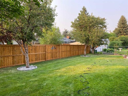 10723 Willowfern Drive Se, Calgary, AB - Outdoor With Backyard