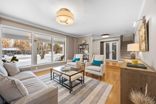 10723 Willowfern Drive Se, Calgary, AB - Indoor Photo Showing Living Room