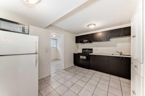 3715 14 Street Nw, Calgary, AB - Indoor Photo Showing Kitchen With Double Sink