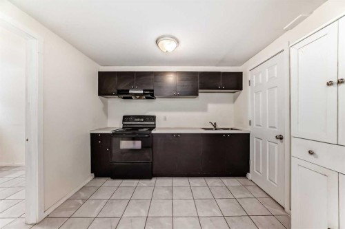 3715 14 Street Nw, Calgary, AB - Indoor Photo Showing Kitchen With Double Sink